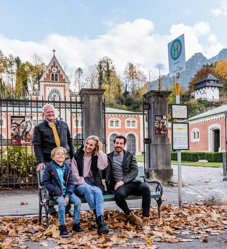 Family at the bus stop in front of the Old Salt Works