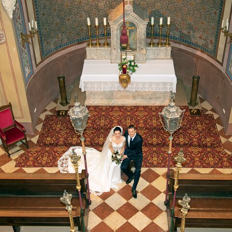 Bride and groom in front of the altar in the Saline Chapel