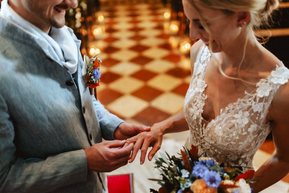Putting on a wedding ring in the old salt works in Bad Reichenhall 