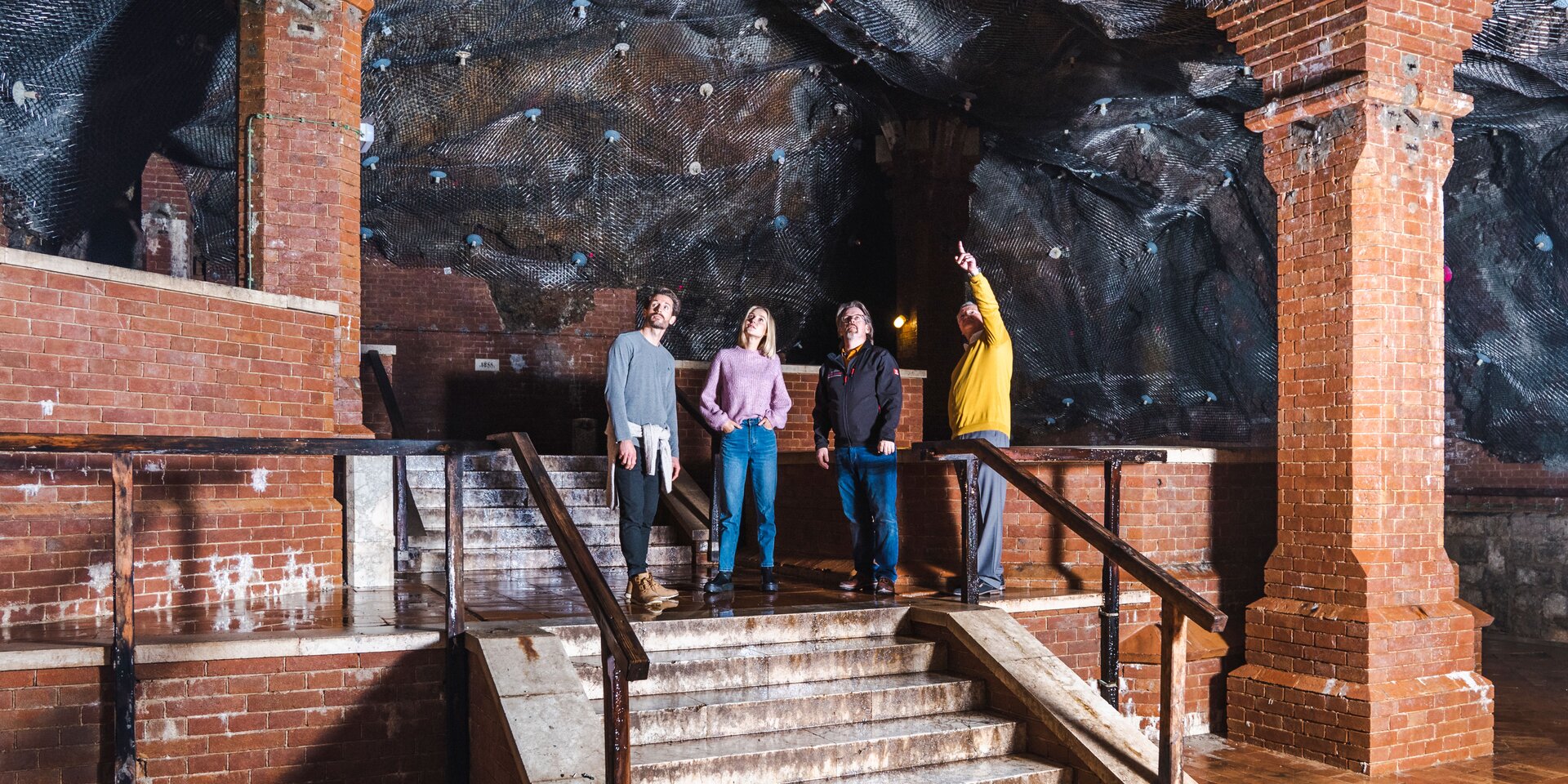 Guide with guests in the salt cave