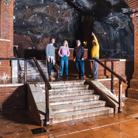 Guide with guests in the salt cave